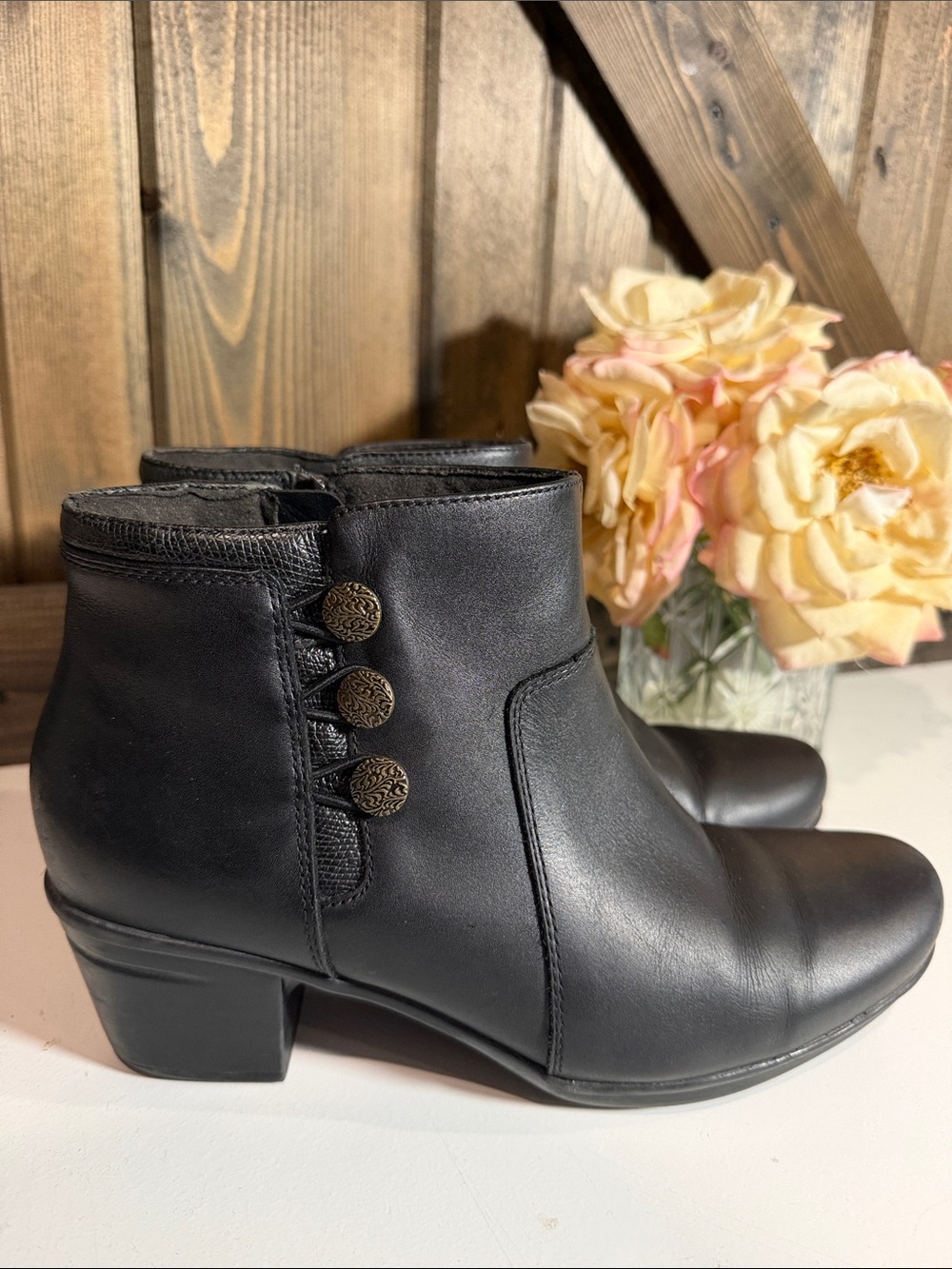 Clarks Black Leather Ankle Boots with Decorative Button Accents